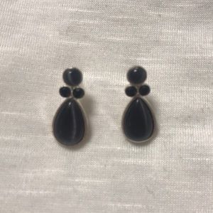 Black post earrings with silver edges